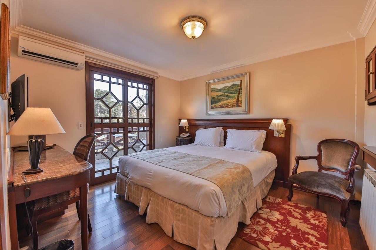 Le Suisse Elegance Hotel Кампус-ду-Жордау Экстерьер фото