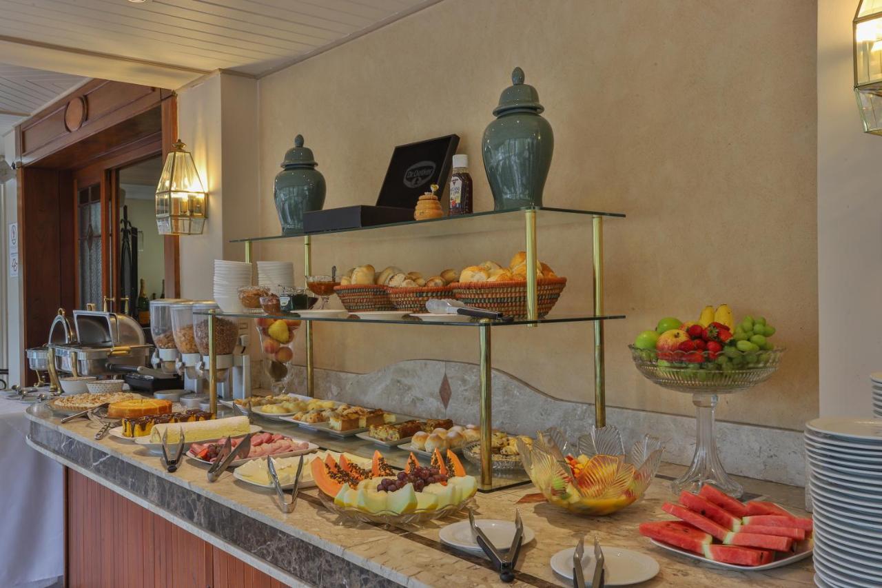 Le Suisse Elegance Hotel Кампус-ду-Жордау Экстерьер фото