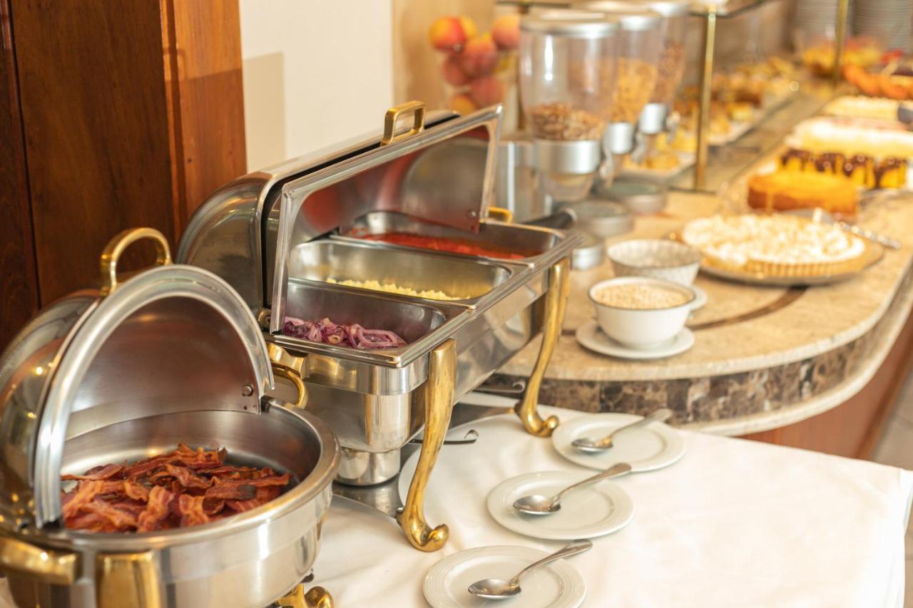 Le Suisse Elegance Hotel Кампус-ду-Жордау Экстерьер фото