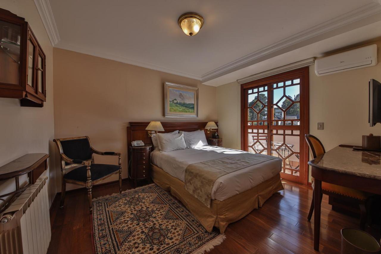 Le Suisse Elegance Hotel Кампус-ду-Жордау Экстерьер фото