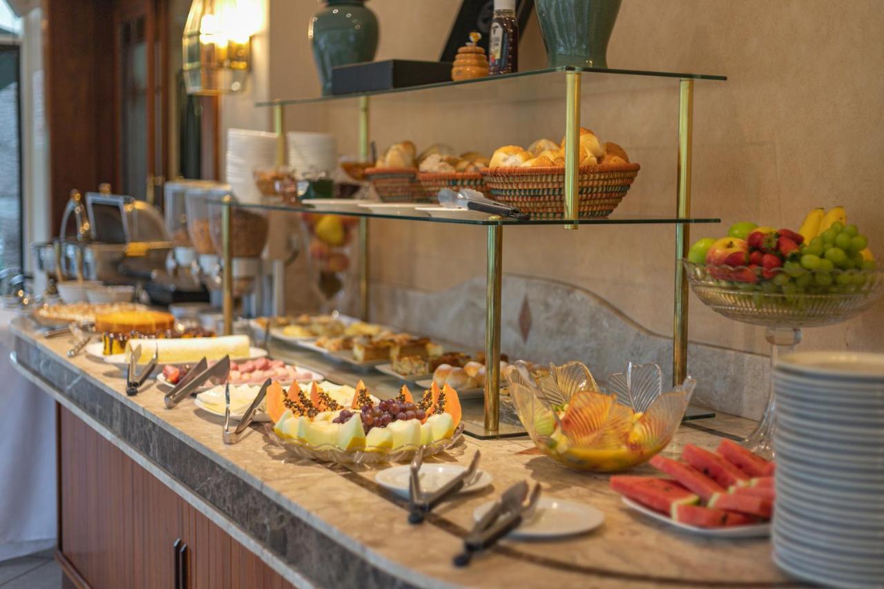 Le Suisse Elegance Hotel Кампус-ду-Жордау Экстерьер фото