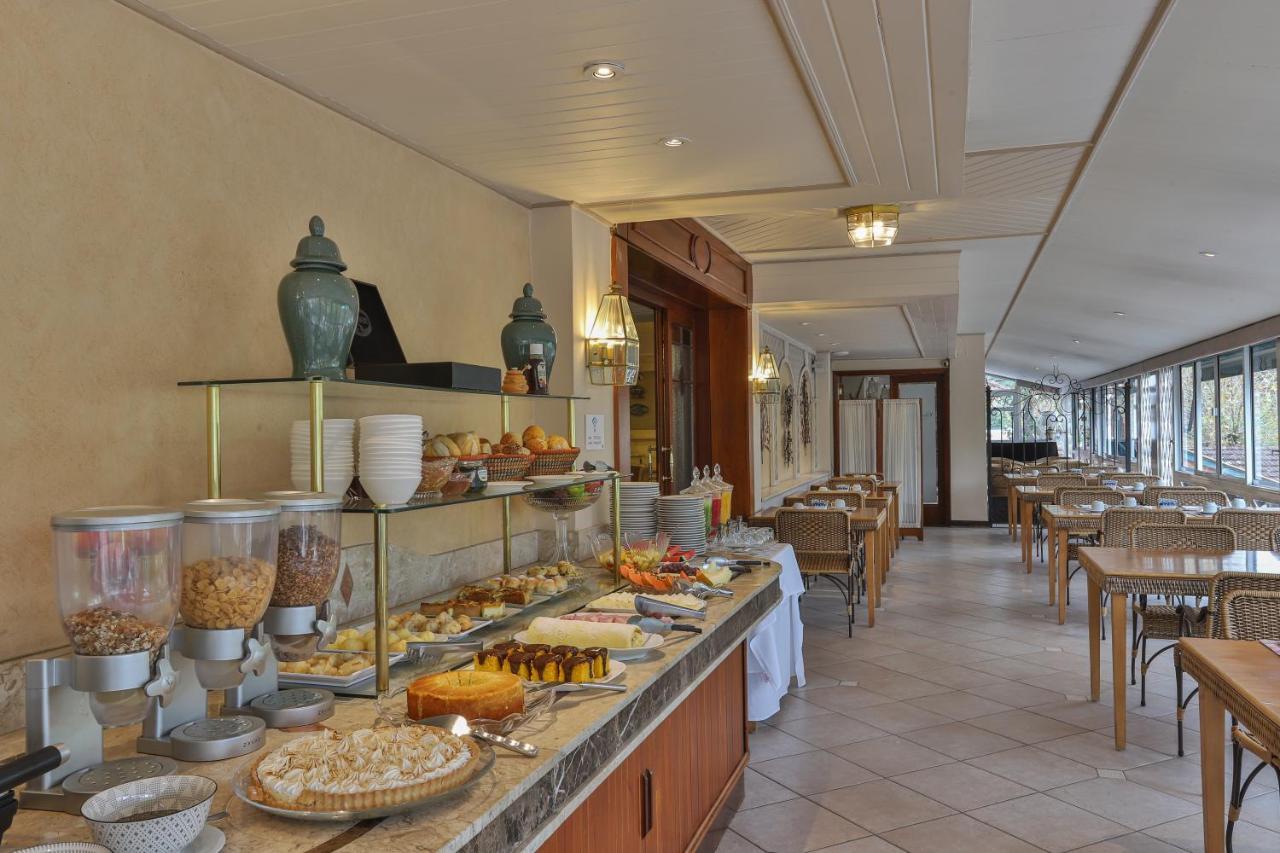 Le Suisse Elegance Hotel Кампус-ду-Жордау Экстерьер фото