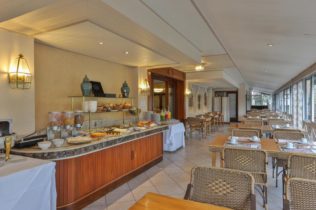 Le Suisse Elegance Hotel Кампус-ду-Жордау Экстерьер фото