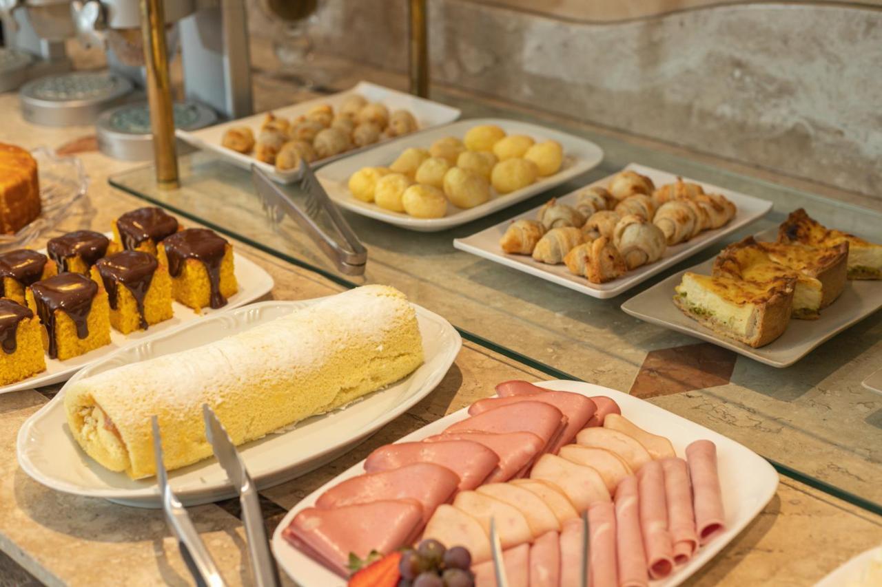 Le Suisse Elegance Hotel Кампус-ду-Жордау Экстерьер фото