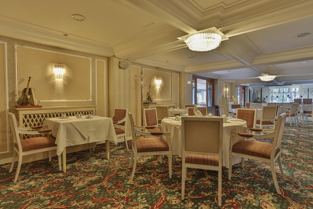 Le Suisse Elegance Hotel Кампус-ду-Жордау Экстерьер фото