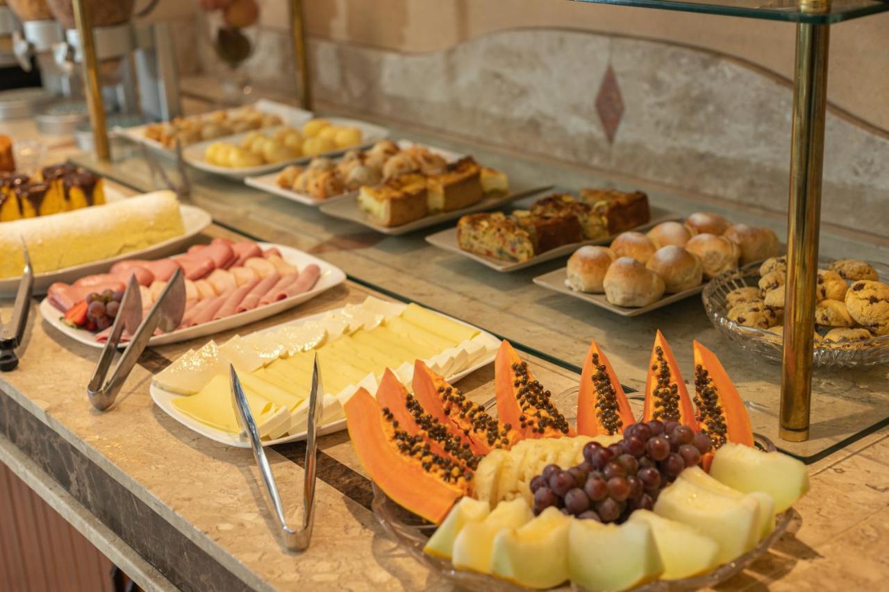 Le Suisse Elegance Hotel Кампус-ду-Жордау Экстерьер фото